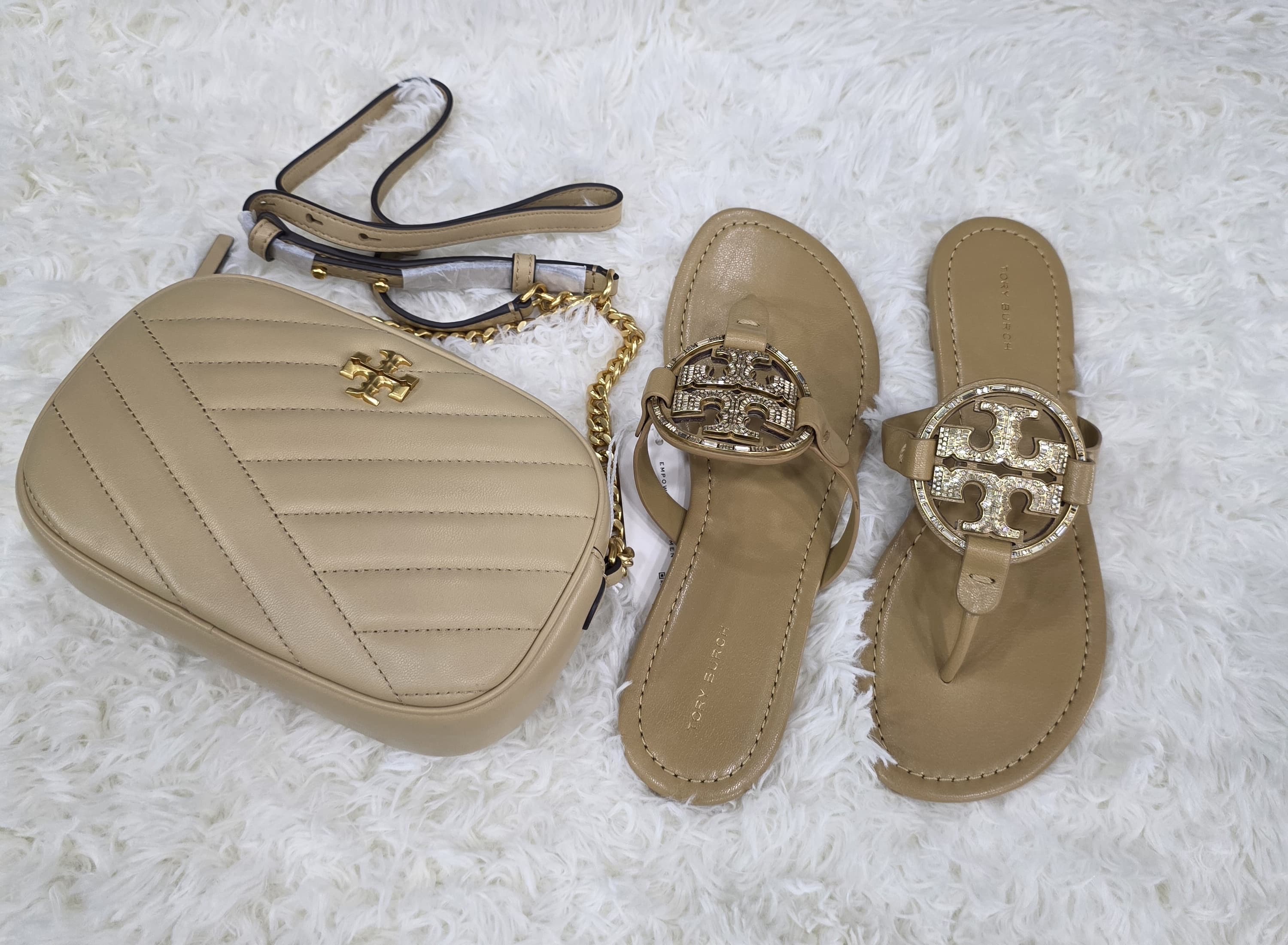 Beige branded handbag and slippers photo at The Source Arena JA.